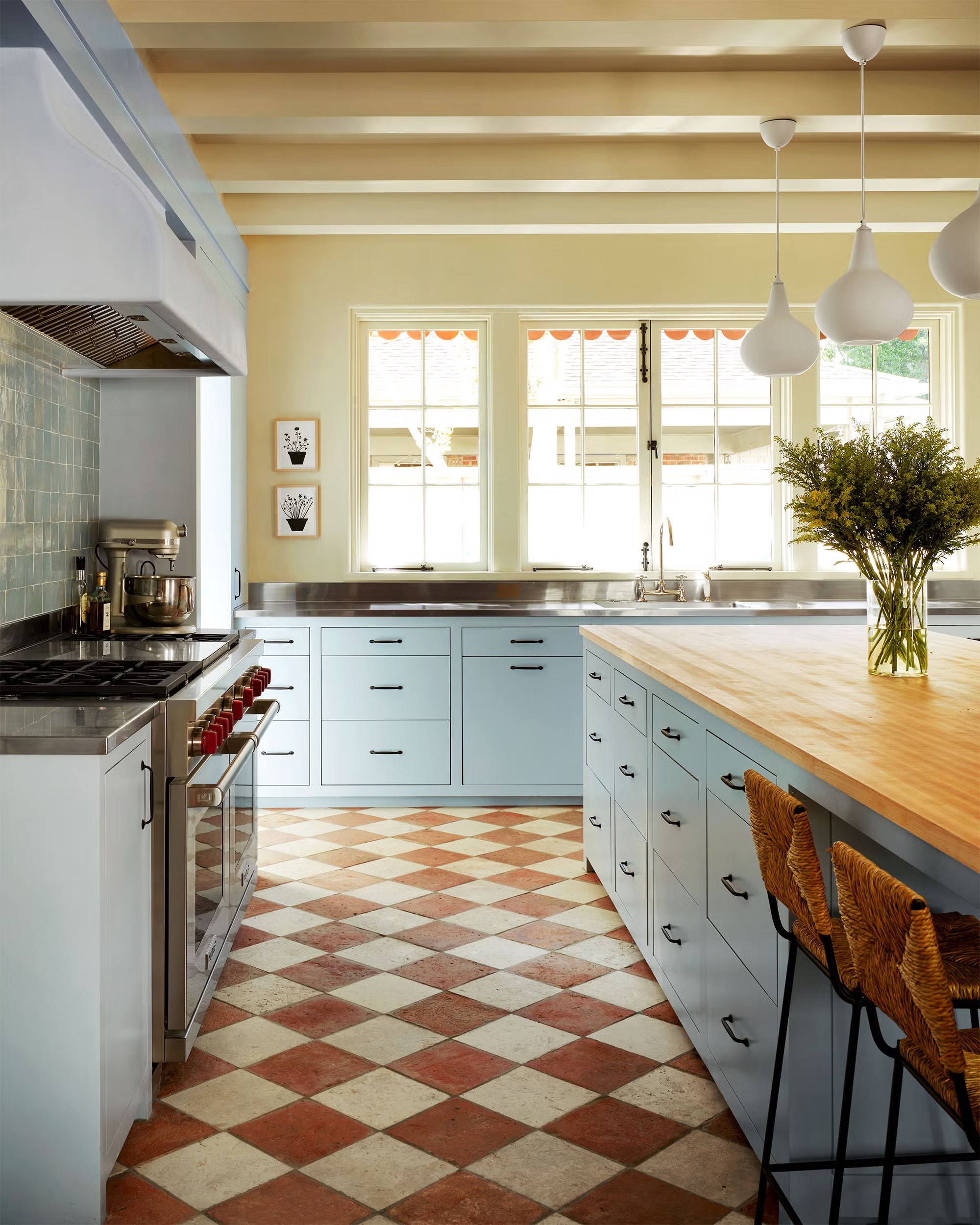 Kitchen with checkerboard terracotta and cream tile floor