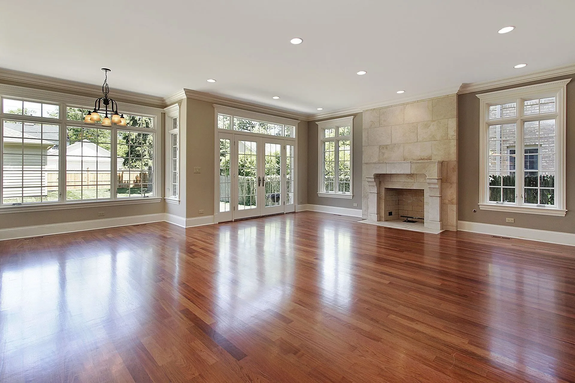 Open living room with polished hardwood floors